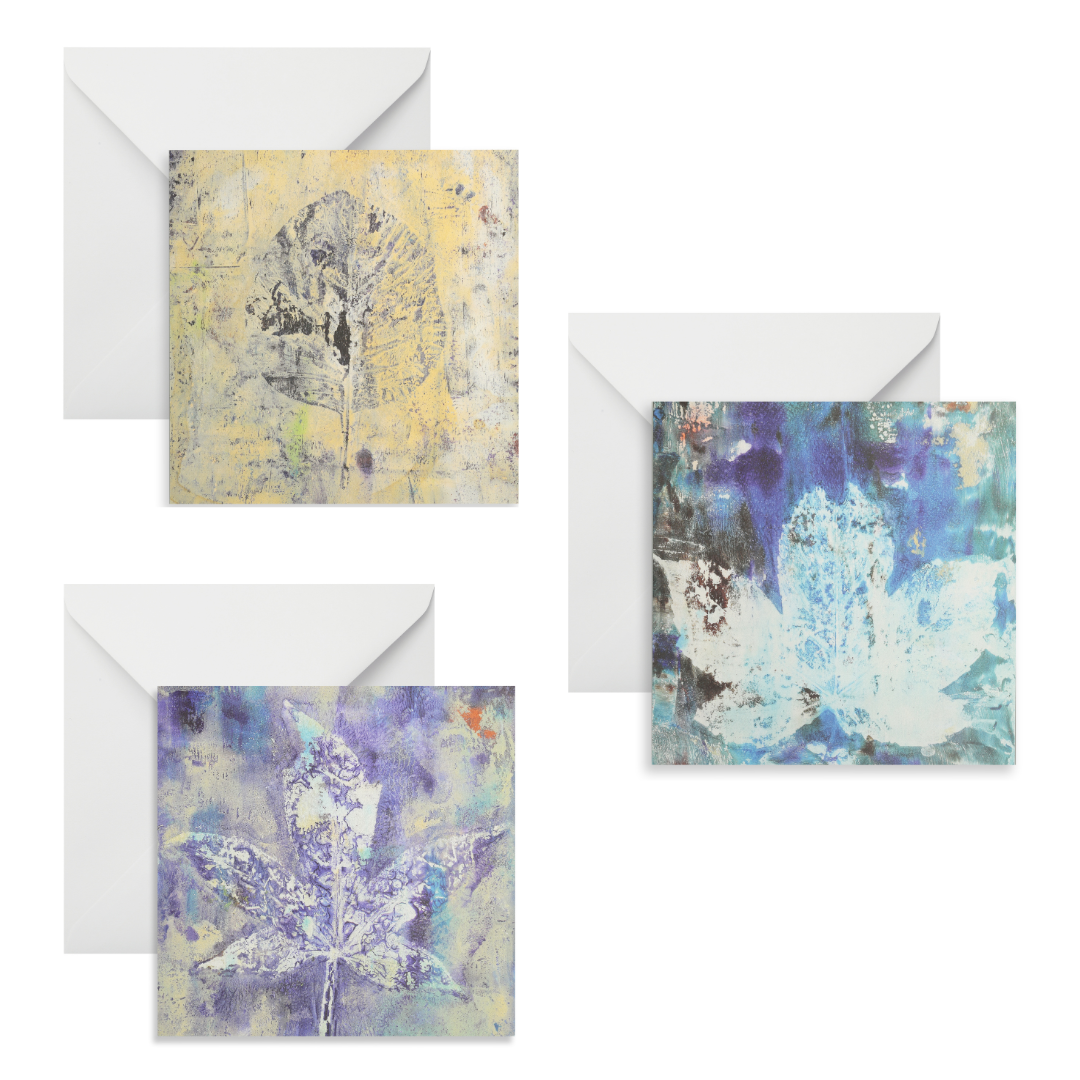 Three art postcards with leaf monoprints in tones of blue, violet and warm cream and yellow.  White envelopes shown.