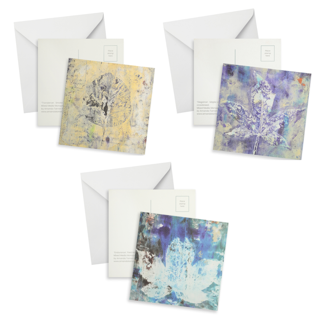 Three art postcards with leaf monoprints in tones of blue, violet and warm cream and yellow.  Reverse of cards and white envelopes shown.